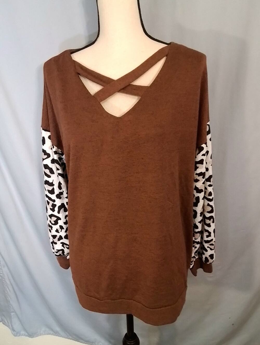 Shein. Brown sweater with Cheetah print sleeves